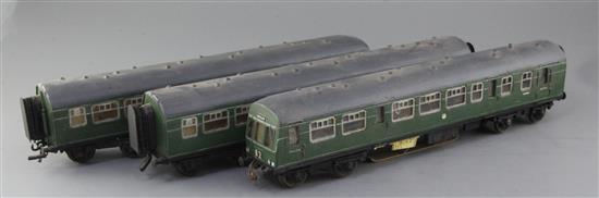 A three car set, British Rail D.M.U. single motors, skate pick up nos. E56407, 8 and 9, with interior lighting, overall 114cm